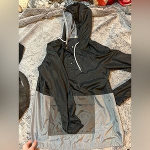 Black and grey windbreaker